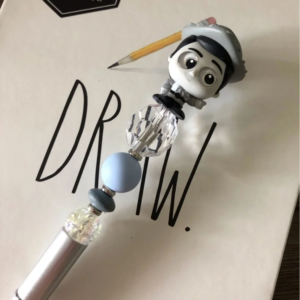 Disney doorables: Toy Story: Woody’s Round Up: Woody handmade beaded pen
